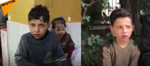 Dečak iz Sirije priča o režiranom hemijskom napadu u Dumi Dečak iz Sirije priča o režiranom hemijskom napadu u Dumi - Sputnik Srbija