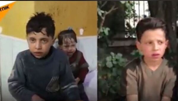 Dečak iz Sirije priča o režiranom hemijskom napadu u Dumi - Sputnik Srbija