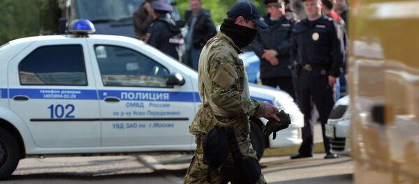 Сотрудник ФСБ в Москве Сотрудник ФСБ в Москве - Sputnik Србија