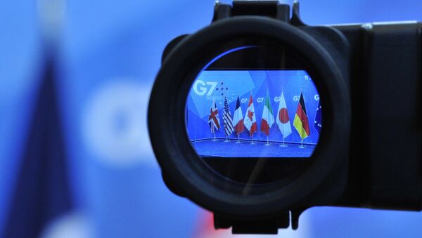 Flags are seen in a camera screen at the G7 summit (file) - Sputnik Srbija
