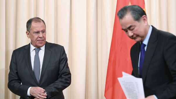 Šefovi diplomatije Rusije i Kine, Sergej Lavrov i Van Ji - Sputnik Srbija