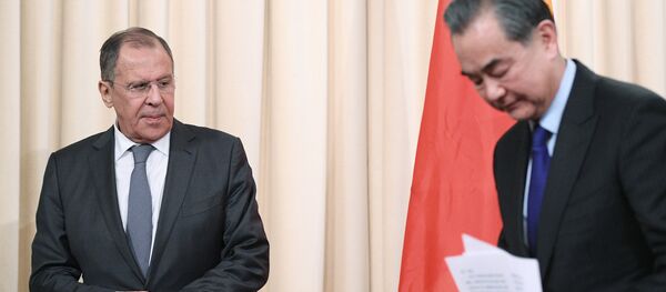 Šefovi diplomatije Rusije i Kine, Sergej Lavrov i Van Ji - Sputnik Srbija