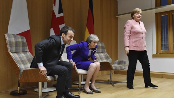Predsednik Francuske Emanuel Makron, premijerka Velike Britanije Tereza Mej i nemačka kancelarka Angela Merkel. - Sputnik Srbija