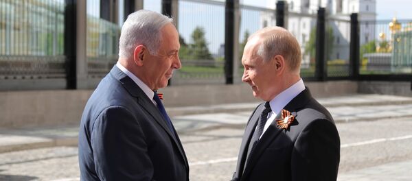 Председник Русије Владимир Путин и премијер Израела Бењамин Нетанијаху на парада поводом Дана победе у Москви. - Sputnik Србија
