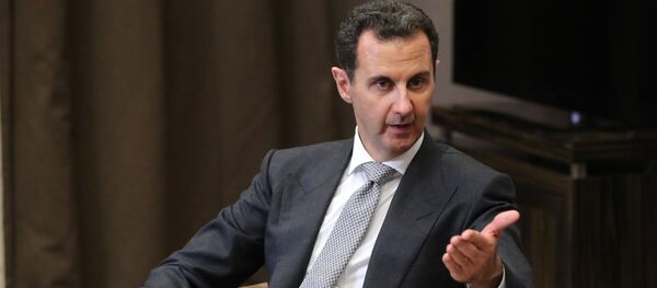 Председник Сирије Башар Асад током састанка са председником Русије Владимиром Путином - Sputnik Србија