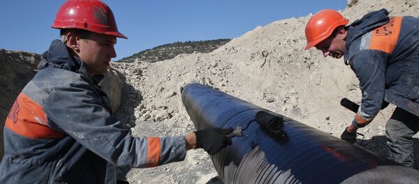 Radnici Krimskog republičkog preduzeća Černomorneftgas Radnici Krimskog republičkog preduzeća Černomorneftgas - Sputnik Srbija