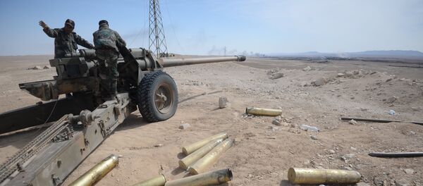 Припадници сиријске војске током офанзиве на град Ел Карјатејн - Sputnik Србија
