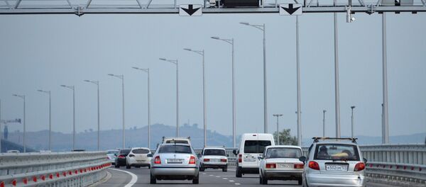 Пуштање у рад друмског саобраћаја преко Кримског моста - Sputnik Србија