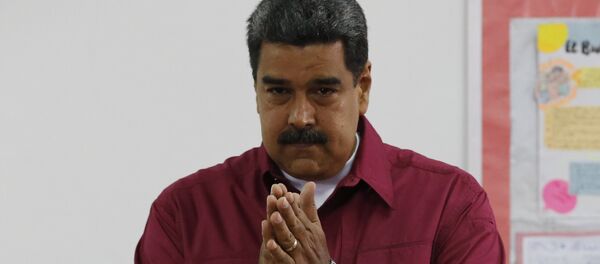 Председник Венецуеле Николас Мадуро током гласања - Sputnik Србија