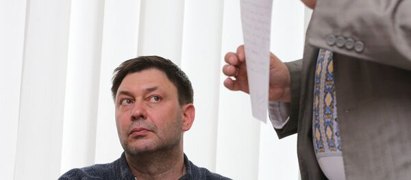 Novinar Kiril Višinski, urednik portala RIA Novosti Ukrajina na sudu u Hersonu Novinar Kiril Višinski, urednik portala RIA Novosti Ukrajina na sudu u Hersonu - Sputnik Srbija
