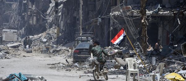 Порушене зграде у ослобођеном кампу палестинских избеглица Јармук на југу Дамаска - Sputnik Србија