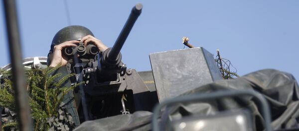 Естонски војник на НАТО вежби - Sputnik Србија