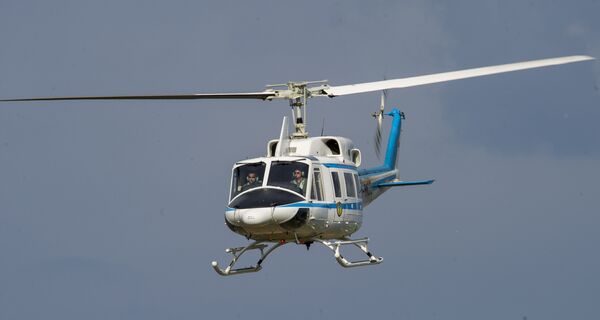 Helikopter MUP-a na završnim pripremama za centralnu ceremoniju Dana Ministarstva unutrašnjih poslova. Helikopter MUP-a na završnim pripremama za centralnu ceremoniju Dana Ministarstva unutrašnjih poslova. - Sputnik Srbija