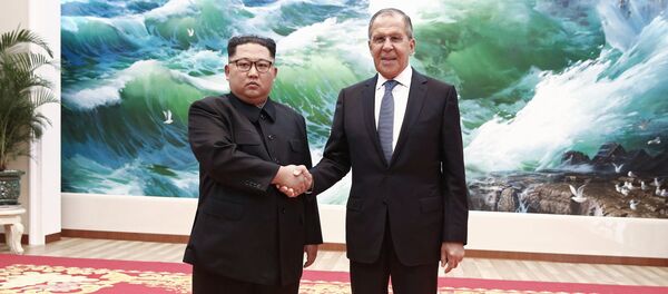 Ким Џонг Ун и Сергеј Лавров - Sputnik Србија