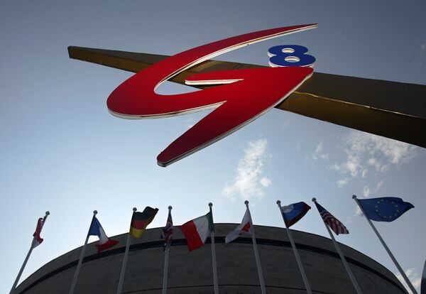 Шта Меркелова и Џонсон мисле о повратку Русије у Г8 Шта Меркелова и Џонсон мисле о повратку Русије у Г8 - Sputnik Србија