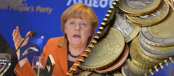 Немачка канцеларка Анегла Меркел и евро - Sputnik Србија