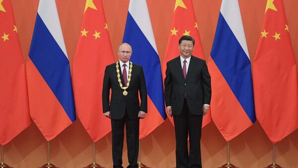 Predsednik Rusije Vladimir Putin i predsednik Kine Si Đinping - Sputnik Srbija