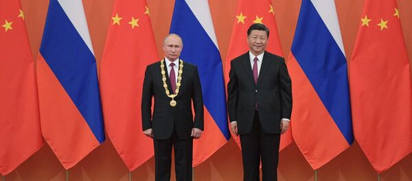 Predsednik Rusije Vladimir Putin i predsednik Kine Si Đinping - Sputnik Srbija