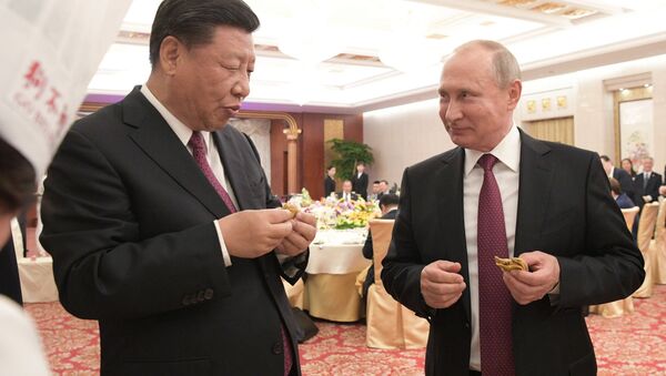 Ruski predsednik Vladimir Putin i kineski predsednik Si Đinping - Sputnik Srbija