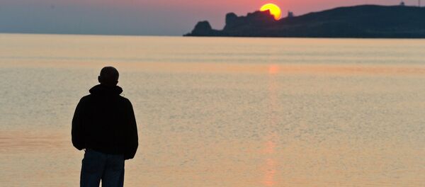 Рассвет над мысом Изюк на берегу Азовского моря в окрестностях поселка Курортное - Sputnik Србија