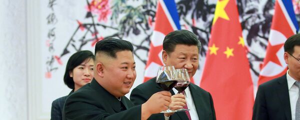 Ким Џонг Ун и Си Ђинпинг - Sputnik Србија