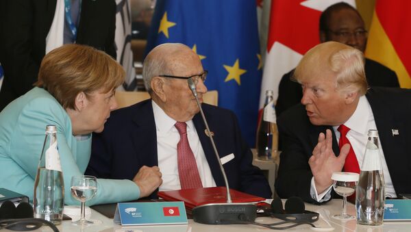 Ангела Меркел и Доналд Трамп  на Самиту Г7 - Sputnik Србија