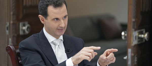 Президент Сирии Башар Асад во время интервью Президент Сирии Башар Асад во время интервью - Sputnik Србија