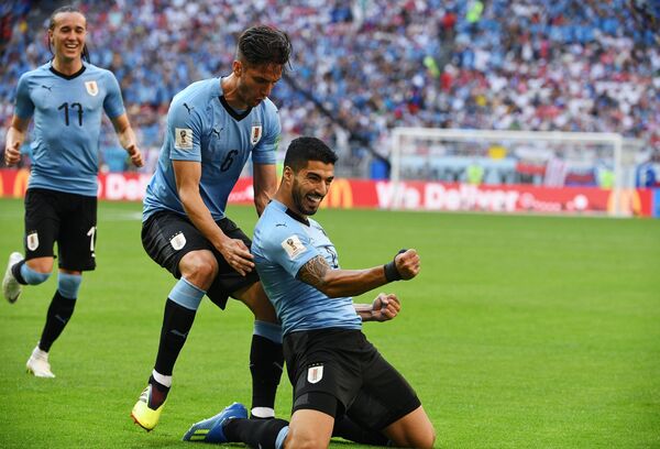 Славље Уругваја после гола Суареза Славље Уругваја после гола Суареза - Sputnik Србија
