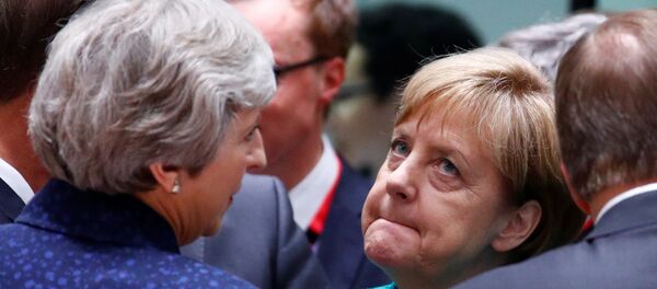 Немачка канцеларка Ангела Меркел и британска премијерка Тереза Меј на самиту лидера ЕУ у Бриселу - Sputnik Србија