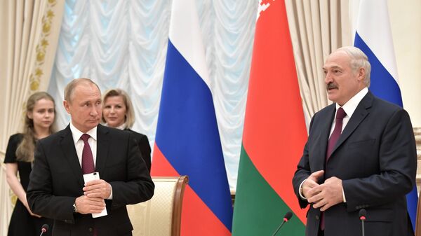 Председници Русије и Белорусије, Владимир Путин и Александар Лукашенко на заседању Врховног државног савета у Минску - Sputnik Србија