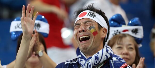 Навијачи Јапана у сузама после примљеног гола у 94. минуту Навијачи Јапана у сузама после примљеног гола у 94. минуту - Sputnik Србија