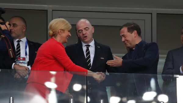 Kolinda Gabro Kitarović Đani Infantino i Dmitrij Medvedev na stadionu u Sočiju - Sputnik Srbija