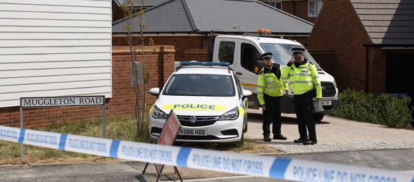 Полицајци испред куће жртава тровања у Ејмсберију - Sputnik Србија