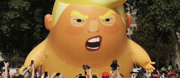 Lutka na naduvavanje s likom Trampa kao bebe tokom posete američkog predsednika Londonu - Sputnik Srbija