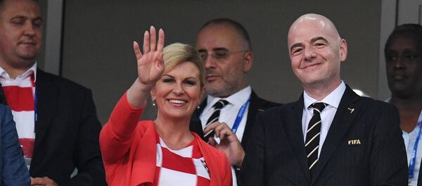 Председница Хрватске Колинда Грабар Китаровић на четвртфиналној утакмици Светског првенства у фудбалу између Хрватске и Русије Председница Хрватске Колинда Грабар Китаровић на четвртфиналној утакмици Светског првенства у фудбалу између Хрватске и Русије - Sputnik Србија