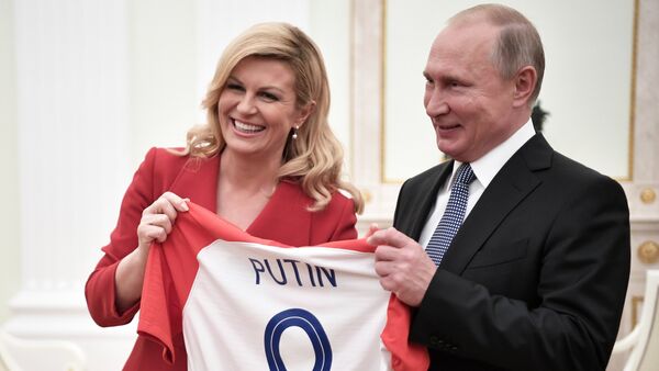 Predsednica Hrvatske Kolinda Grabar Kitarović i predsednik Rusije Vladimir Putin - Sputnik Srbija