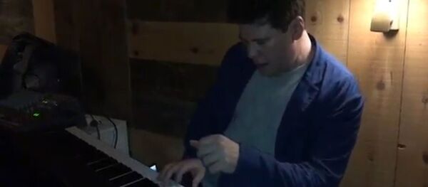 Денис Мацујев - Sputnik Србија