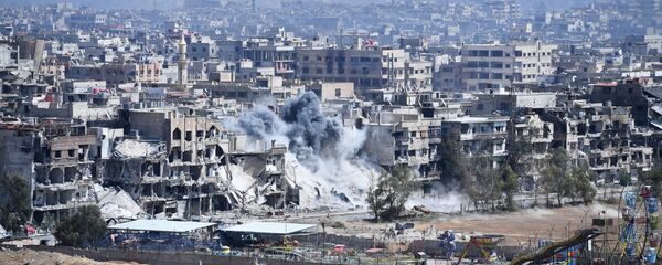 Разрушена стамбена четврт у избегличком кампу Јармук на југу Дамаска - Sputnik Србија