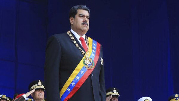 Председник Венецуеле Николас Мадуро на војној паради у Каракасу - Sputnik Србија