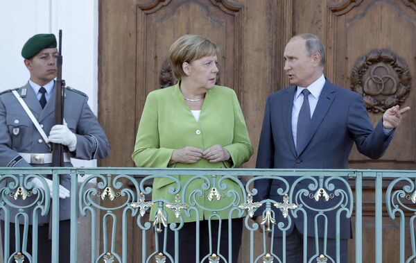 Ангела Меркел и Владимир Путин Ангела Меркел и Владимир Путин - Sputnik Србија