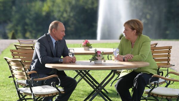 Vladimir Putin i Angela Merkel - Sputnik Srbija