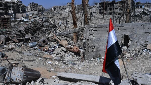 Uništene zgrade na teritoriji bivšeg kampa za palestinske izbeglice Jarmuk u Siriji, nakon oslobođenja od terorista DAEŠ-a - Sputnik Srbija