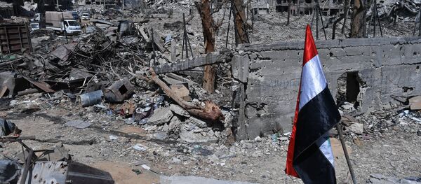 Уништене зграде на територији бившег кампа за палестинске избеглице Јармук у Сирији, након ослобођења од терориста ДАЕШ-а Уништене зграде на територији бившег кампа за палестинске избеглице Јармук у Сирији, након ослобођења од терориста ДАЕШ-а - Sputnik Србија