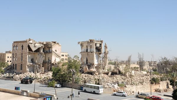 Испод рушевина ове зграде се налази тунел, путем којег су терористи  хтели  да уђу у тврђаву Алепа. Нису успели у томе - Sputnik Србија