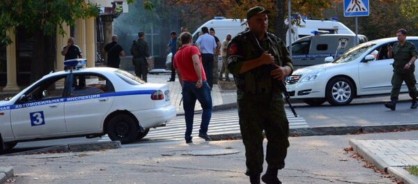 Uviđaj na mestu ubistva Aleksandra Zaharčenka Uviđaj na mestu ubistva Aleksandra Zaharčenka - Sputnik Srbija