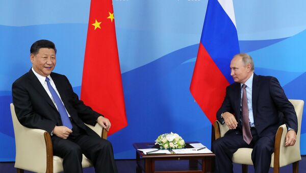 Predsednici Kine i Rusije, Si Đinping i Vladimir Putin, na sastanku u Vladivostoku - Sputnik Srbija