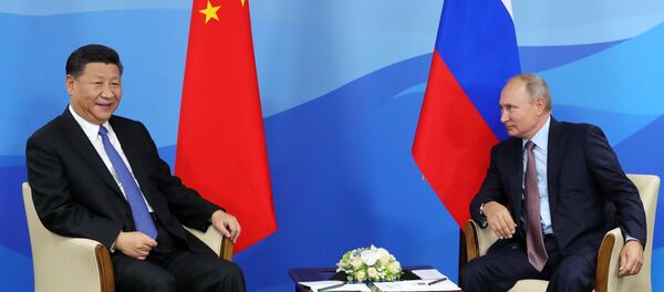 Predsednici Kine i Rusije, Si Đinping i Vladimir Putin, na sastanku u Vladivostoku - Sputnik Srbija