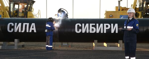 Заваривање цеви магистралног гасовода Снага Сибира Заваривање цеви магистралног гасовода Снага Сибира - Sputnik Србија