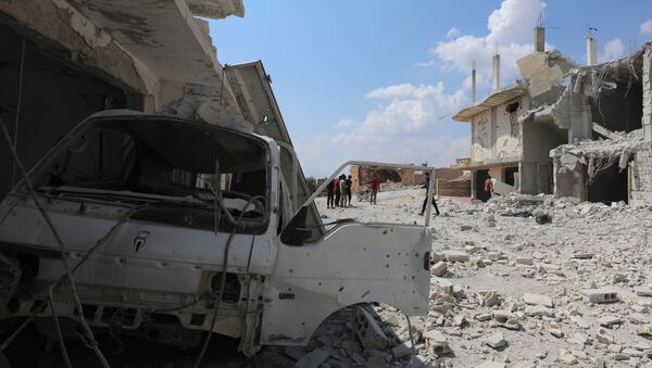Razrušene zgrade nakon bombardovanja grada El Habit na jugu provincije Idlib u Siriji - Sputnik Srbija
