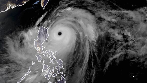 Snimak iz satelita tajfuna Mangkut koji je pogodio Filipine - Sputnik Srbija